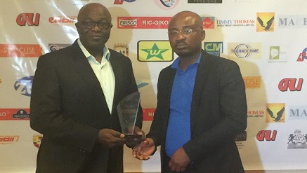 Abiodun Adeoye‎, managing director of Contact Services Limited,‎ (l) received the Company's Best Quality Customer Management Solutions Company of the Year 2015 award.