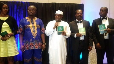 (L-r): Representatives of Lagos State and Imo State Governors; Aminu Waziri Tambuwal, Sokoto State Governor and Lanre Ajayi, ATCON president, during the inauguration of NTIDC and code of conduct for ATCON members.
