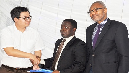 (L-r): Young Kang, sales director, Europe, Middle East and Africa region for KAON; Babatope Agbeyo, chairman of Media Concepts International (MCI and Emeka Mba, director general of Nigeria Broadcasting Commission (NBC), during the signing of Set-Top box manufacturing plant agreement between MCI and KAON in Lagos recently.