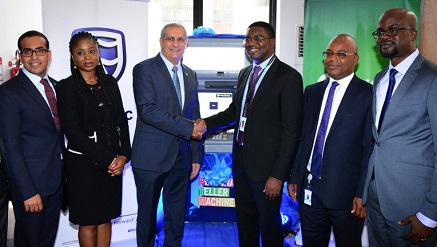 (L-R) Omar El Moataz, Strategic Accounts Director, NCR; Oluwatobi Boshoro, Head, e-Business, Stanbic IBTC Bank; Ahmed Aziz Hamada, Country General Manager, NCR; Obinnia Abajue, Executive Director, Personal and Business Banking, Stanbic IBTC Bank; Abiodun Gbadamosi, Head, Customer Channels, Stanbic IBTC Bank and Damola Giwa, Head, Acquiring e-Business, Stanbic IBTC Bank at the official launch of the Personal Teller Machine by Stanbic IBTC Bank and NCR in Lagos