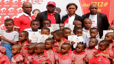 Uduak Ekpo, territory sales manager; Edwin Unoko, zonal business manager; Mrs. Maria Etaike, head teacher  and Emmanuel Nnana, area business manager, with the students of the school, during the presentation at Presbyterian Primary school, Cross River State during the week.
