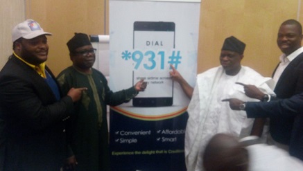 Mr Tayo Adigun, managing director of Credit Switch, supported by other guests during the launch of *931# for credit transfer