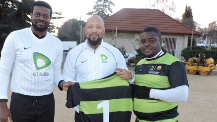 (L-r): Chima Nnorom, goal keeper, Etisalat Football Club; Plato Syrimis, director, Customer Care, Etisalat Nigeria,  and Aanu Oyinloye, oficial, Etisalat Football Club, at the Corporate Soccer Challenge Finals, held in South Africa recently